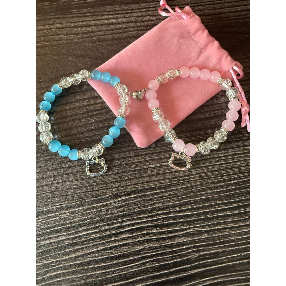 6/$25 NIBWOT Hello Kitty “Best Friends” Pink and Blue Magnetic Bracelet Set